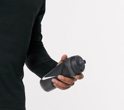 this OG nike squirt bottle helps you get quick hydration on the run 