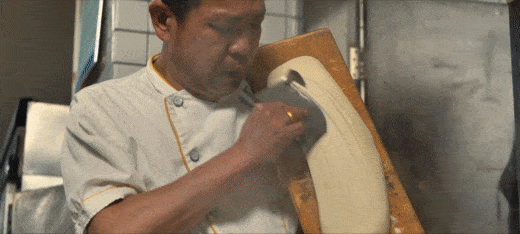 chef making knife cut noodles