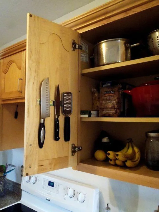 home organisation tips (5) - store knives on inside of cupboards