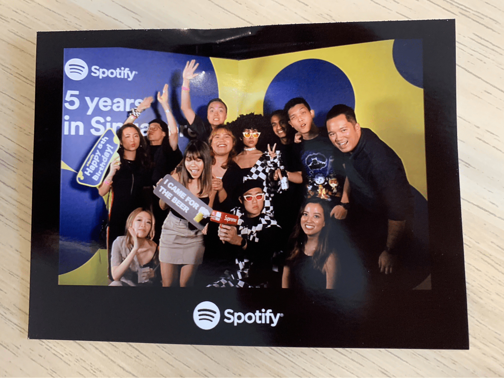 nikki homaili with her colleagues at spotify's 5th anniversary event