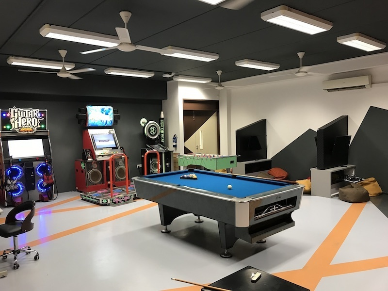 coolest schools in Singapore - Juying Secondary School Chillax student lounge with arcade machines and pool tables