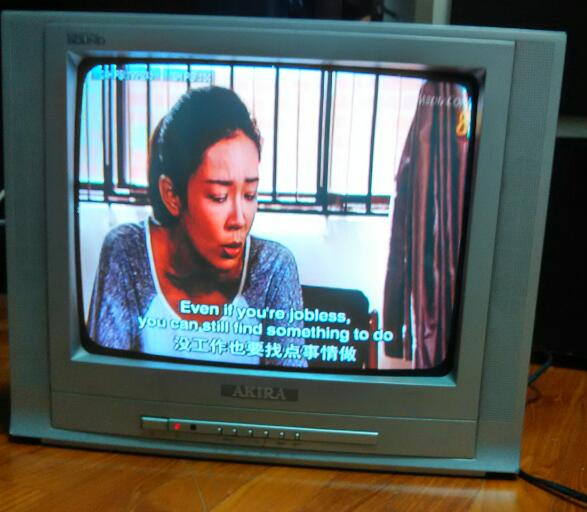 old TV playing channel 8 dramas with English subtitles