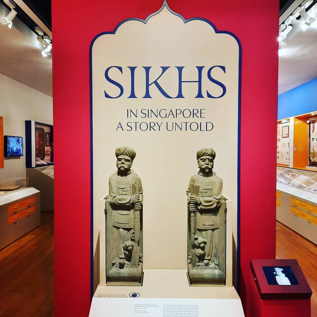 free multicultural activities singapore - sikh exhibit and jaga statues from bukit brown