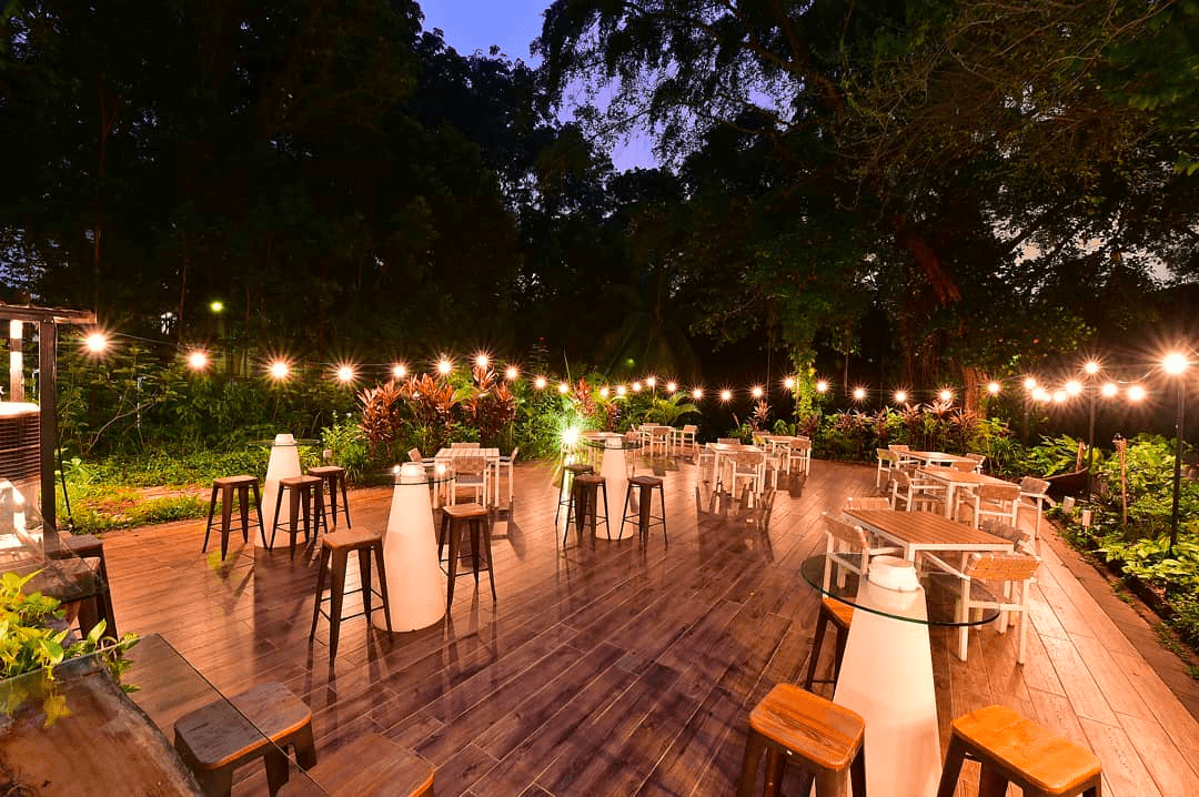 outdoor dining area at spruce restaurant singapore