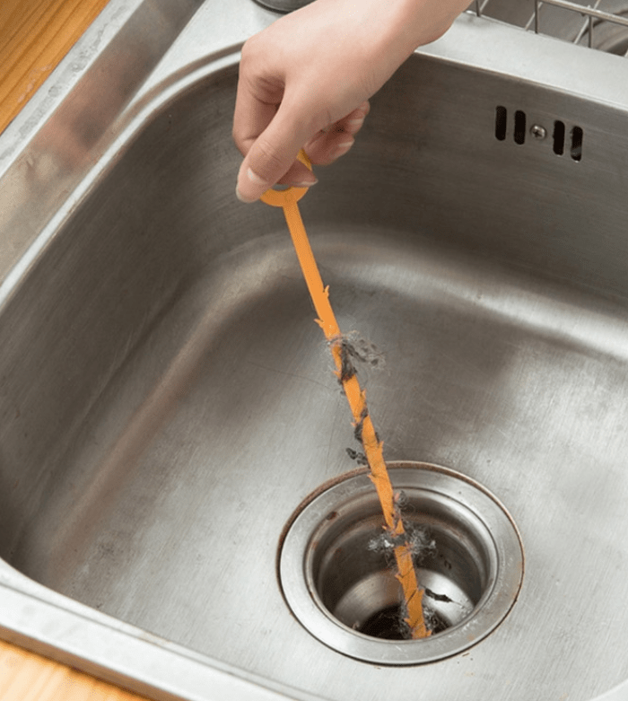 Barbed drain cleaner kitchen sink