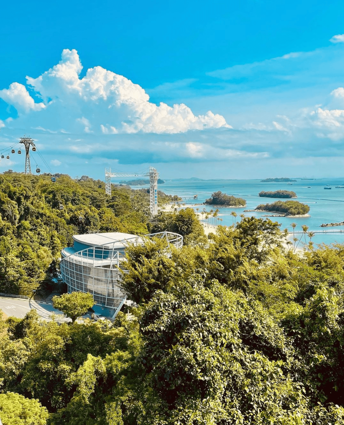  view of sentosa's southwest coast and forest with sea in the background
