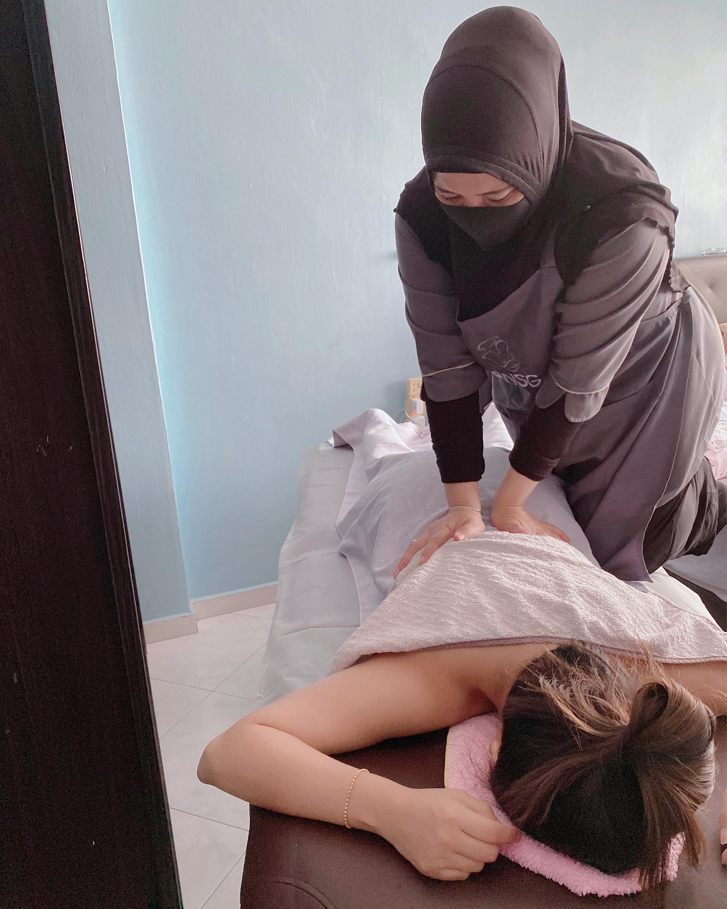 postnatal massage singapore