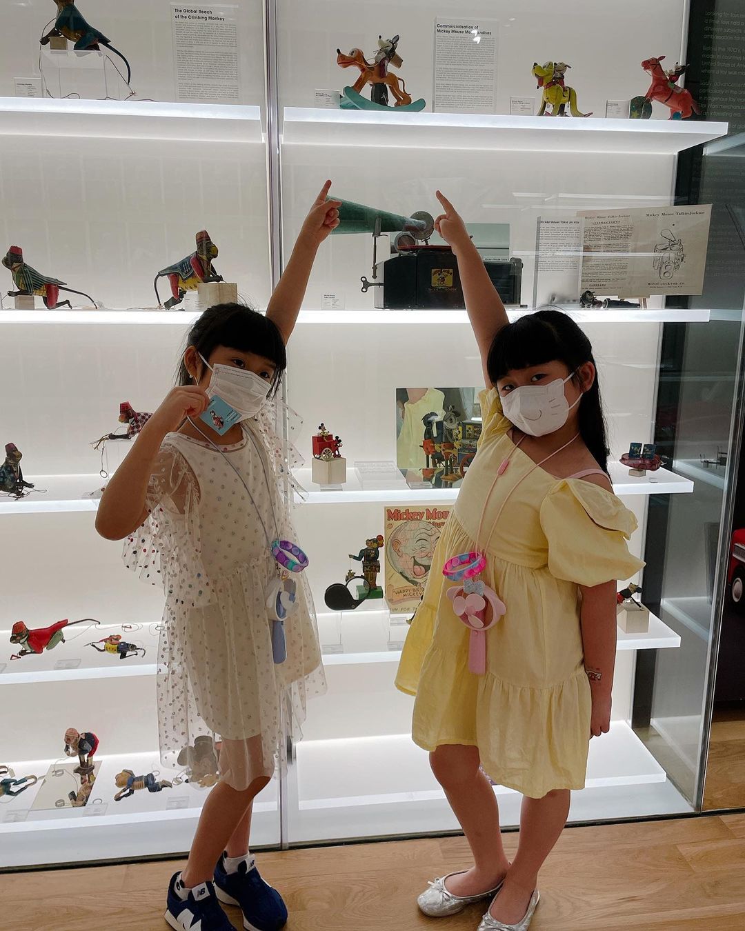 mint museum of toys - children posing with toys