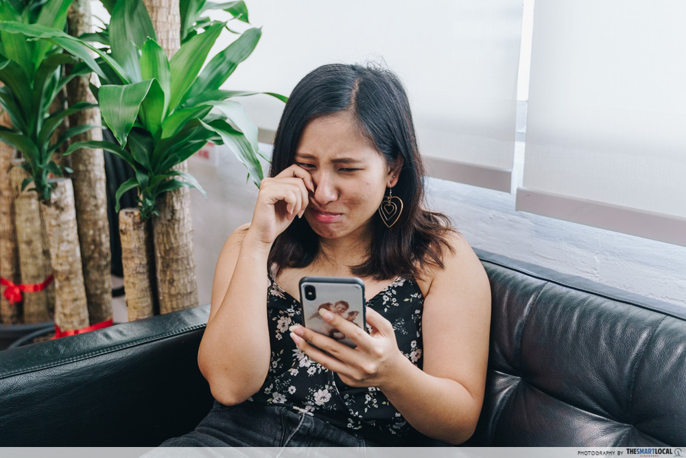 Crying While Using Phone - Finding Love On Dating Apps
