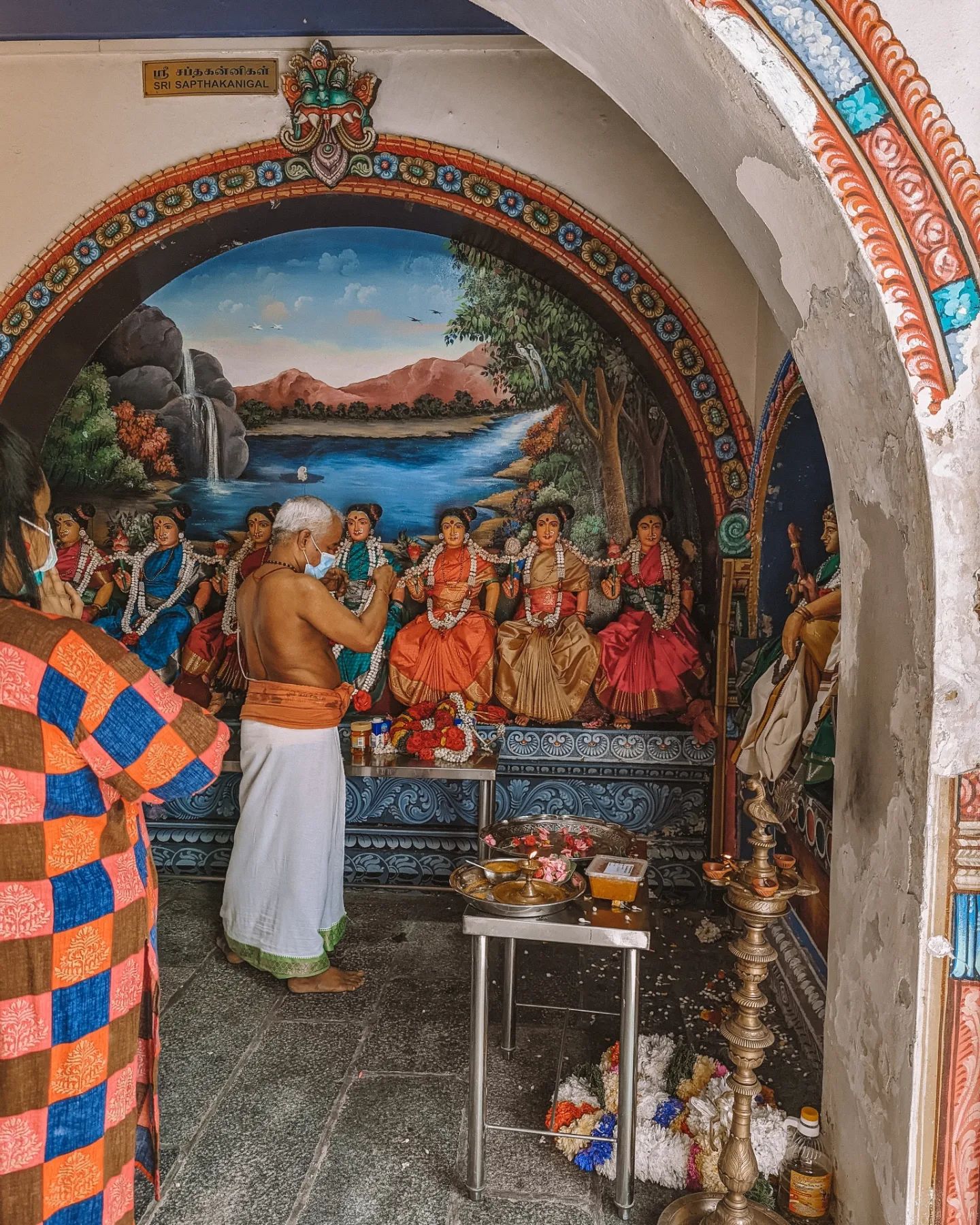  a hindu priest at sri mariamman temple