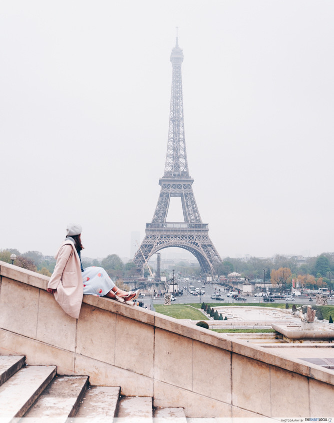 Woman looking at Eiffel Tower 