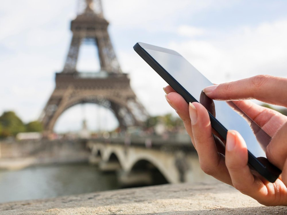 Using phone near Eiffel Tower 