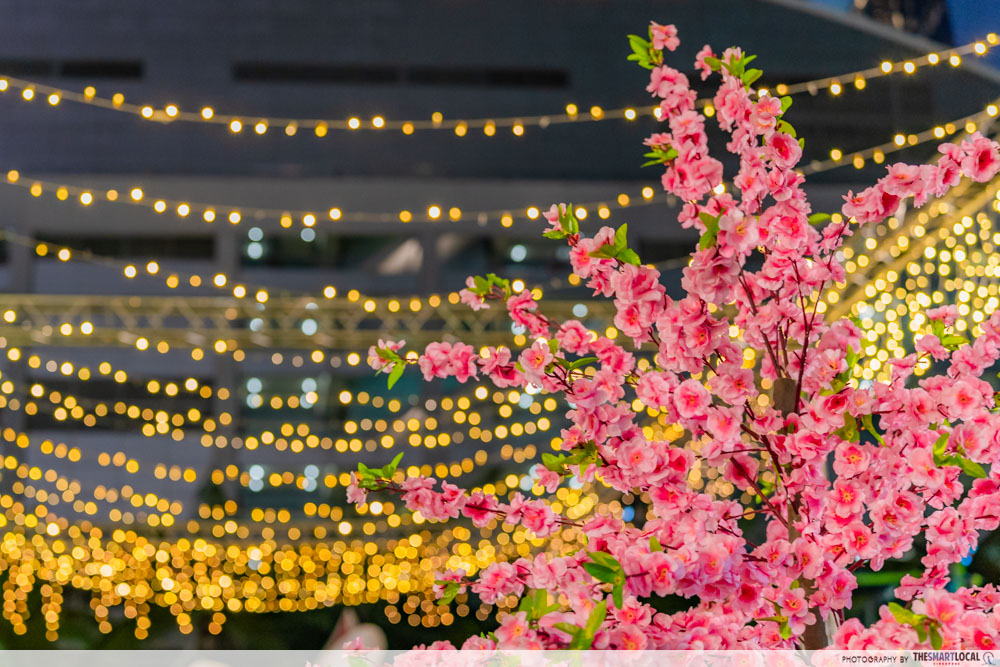 cherry blossom decor and fairy lights at bay spring carnival