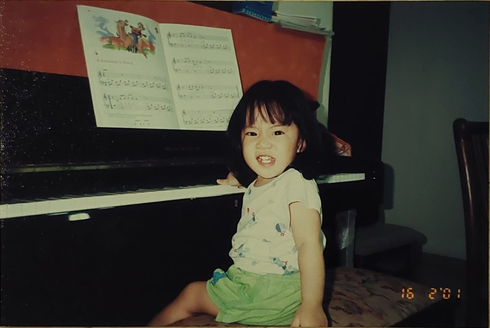 young jamie tan at piano lessons