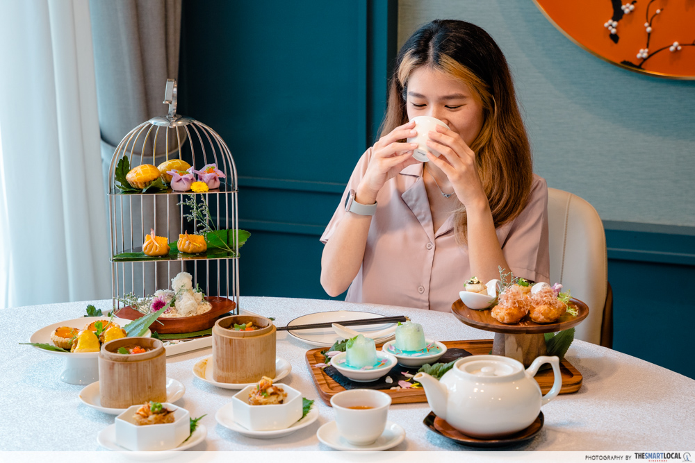 Crystal Jade Pavilion- Girl tasting Pavilion High Tea Set