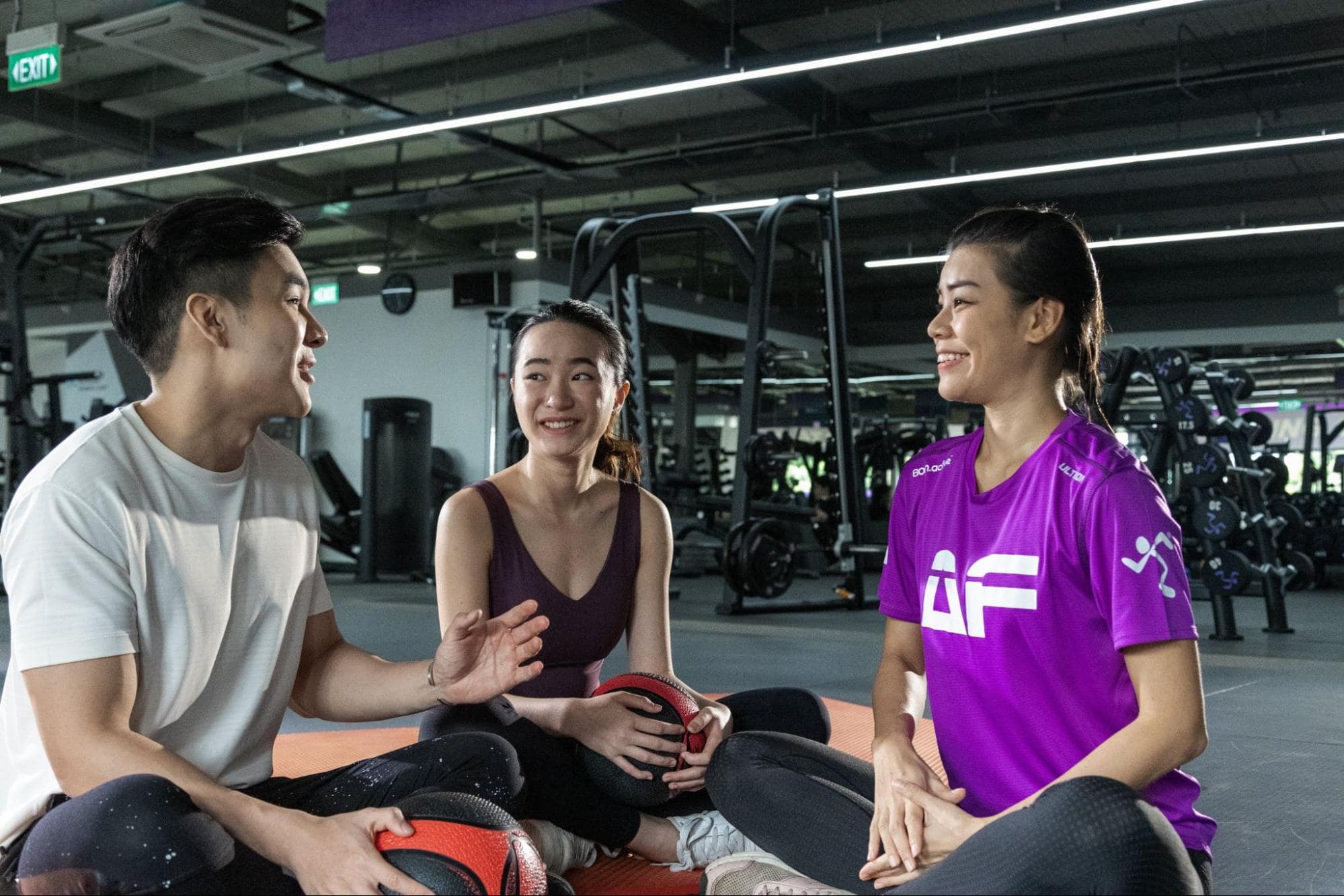 anytime fitness membership-gym goers talking