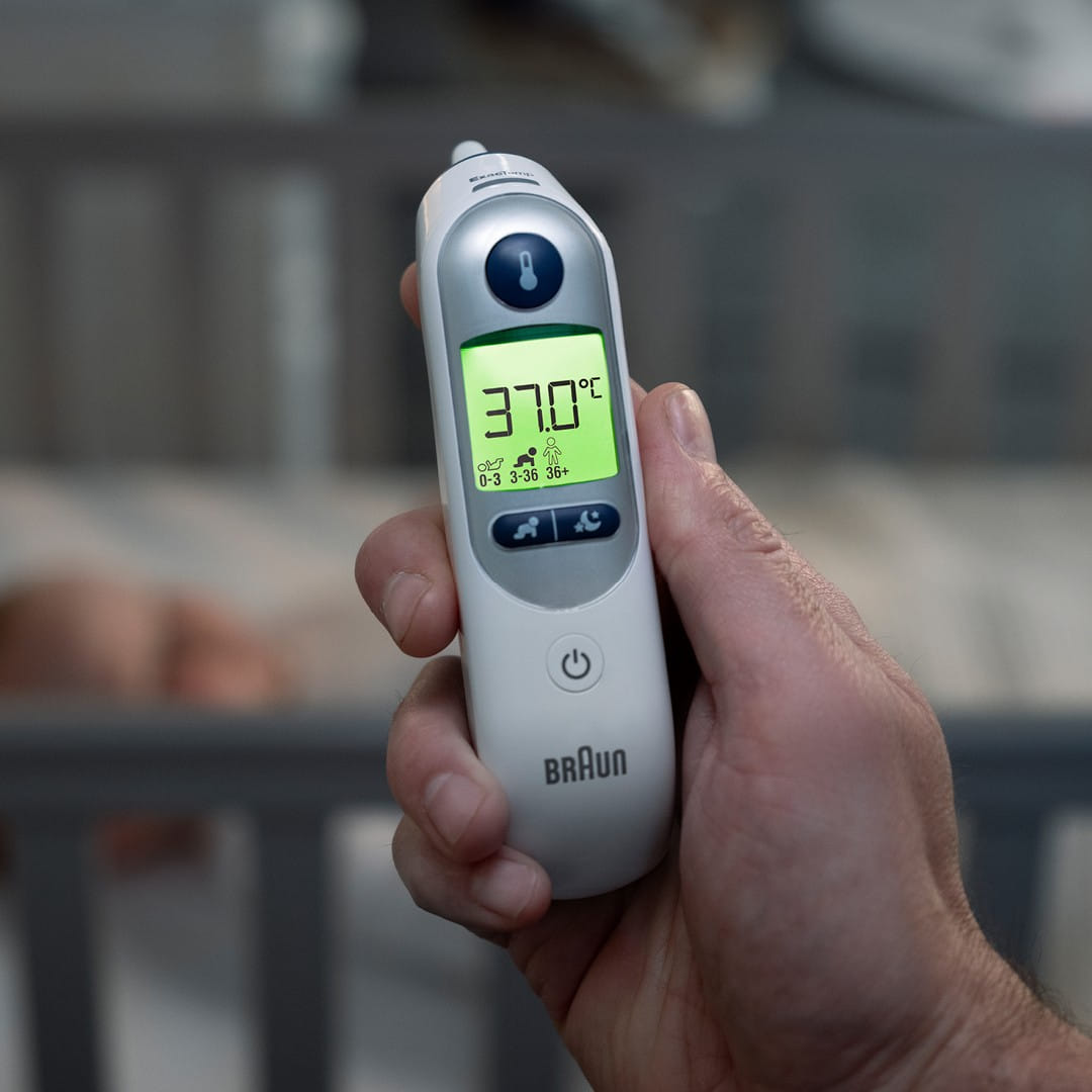 digital thermometer showing 37 degrees temperature