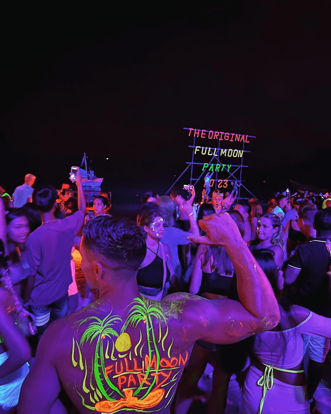 full moon party - neon paint that says fullmoonparty