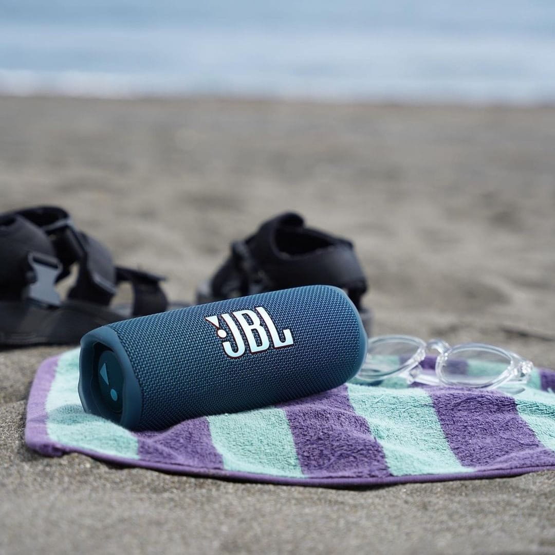 jbl bluetooth speaker on the beach