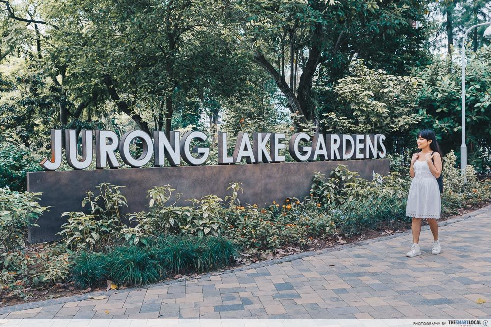 East vs West - Jurong Lake Gardens Sign