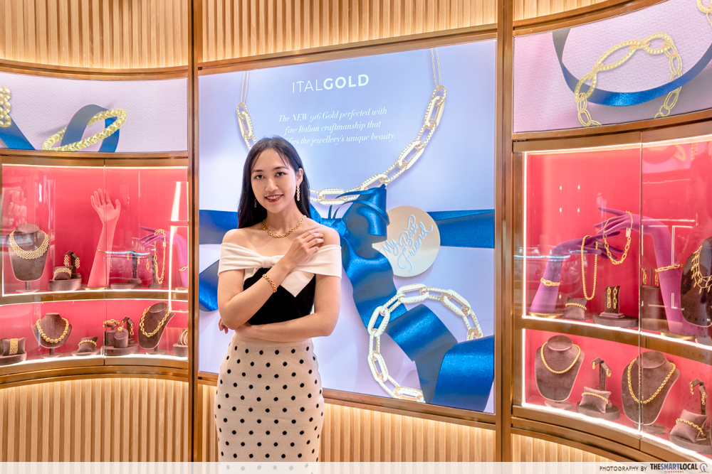 girl posing in front of ITALGOLD display