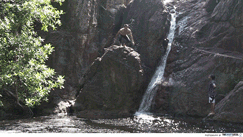 telunas resorts - jungle trek waterfall jump