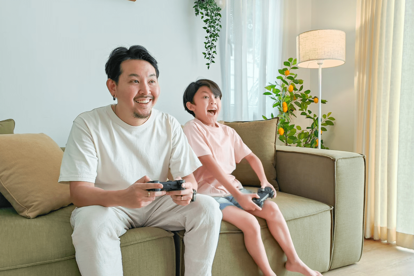Kid Playing Video Games With Father