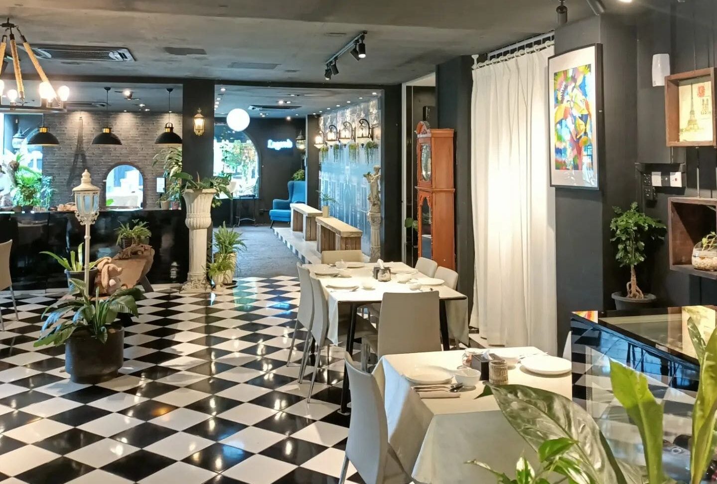 Nature-themed cafes near JB checkpoint - cafe de flore paris-themed interior