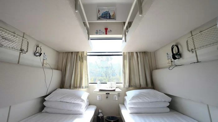 Scenic Train Rides in Asia - The Soft Sleeper berth comes equipped with individual headphones too