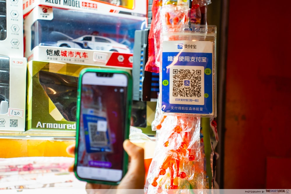 Changi Pay scanning QR codes