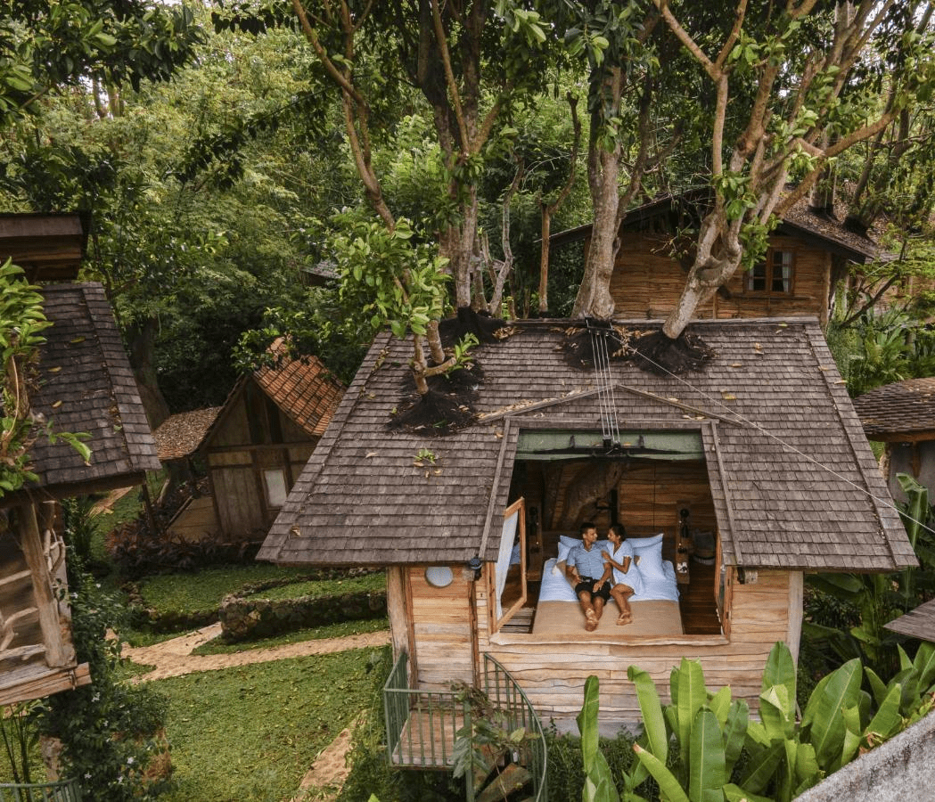 Unique resorts near Singapore - Roots Tree House Bali open rooftop