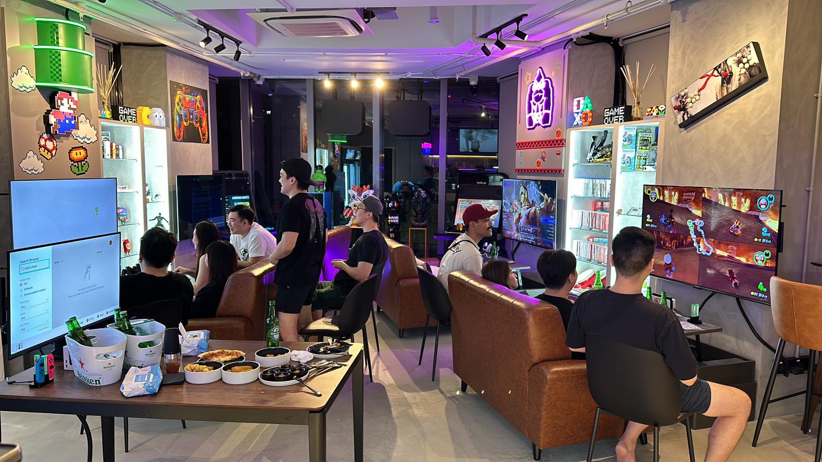 GameOver Gaming Cafe in Dhoby Ghaut - Customers Playing Video Games