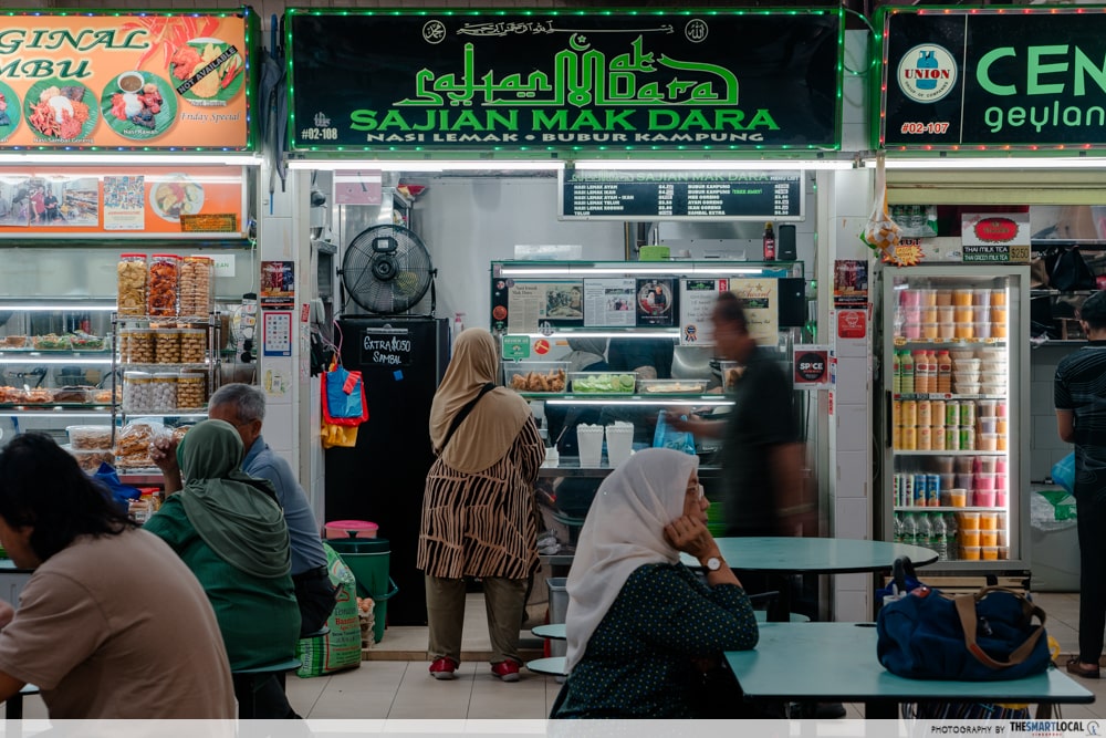 Combating Rising Hawker Food Prices - Elderly Customer Ordering At Sajian Mak Dara
