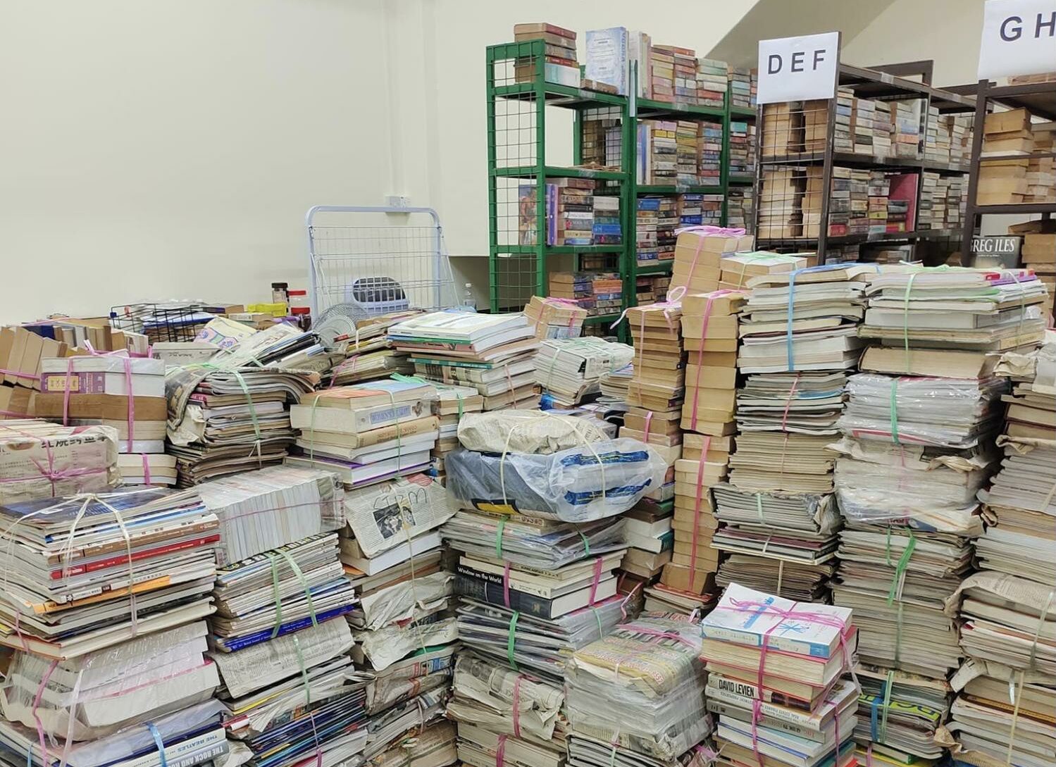 Thrift stores in Johor Bahru - Treasures N Books stacks of book collection