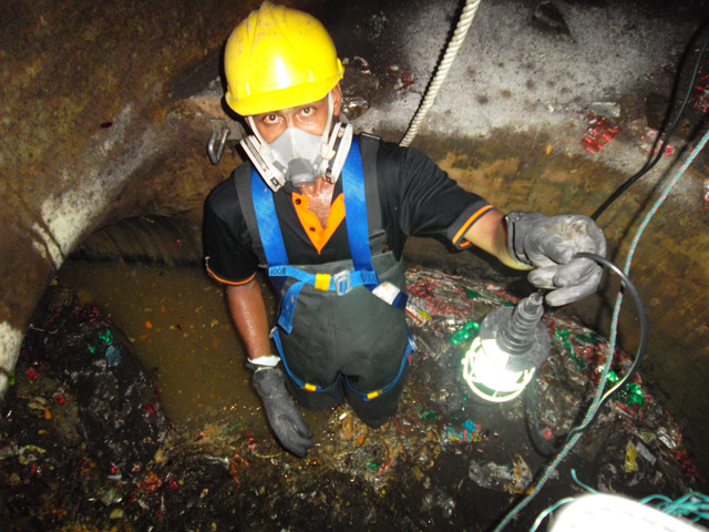 dangerous jobs in singapore - sewage drain cleaner