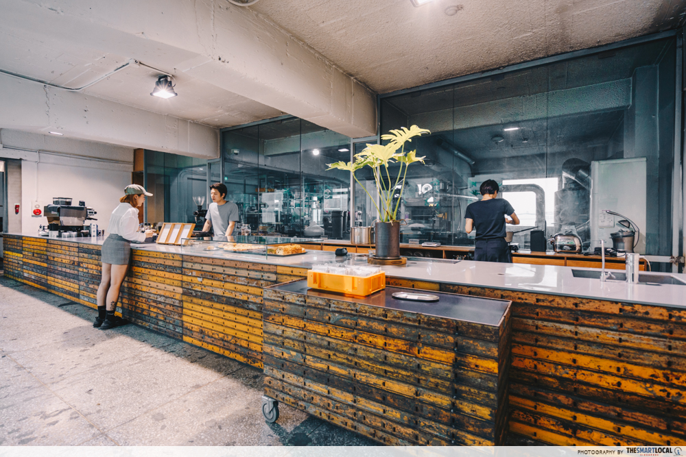 10 unique cafes in Seoul, South Korea - lady ordering at countertop 
