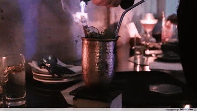 10 unique cafes in Seoul, South Korea- signature cocktail getting torched 