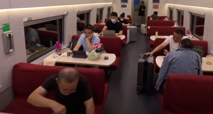 New Hong Kong to Beijing sleeper train - Passengers in dining car 