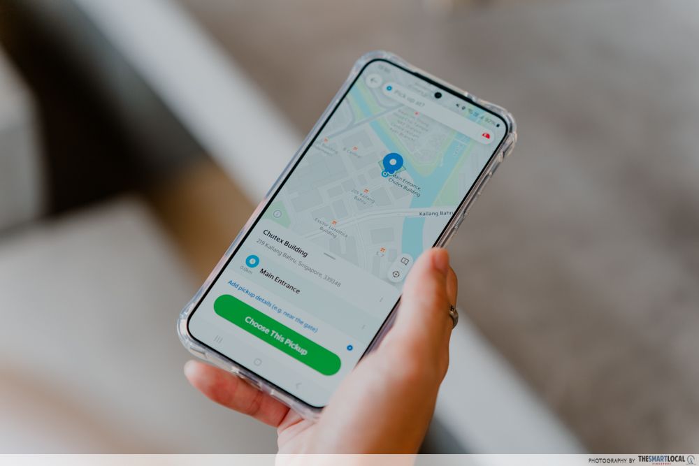 Using Phone To Book A Ride On Grab