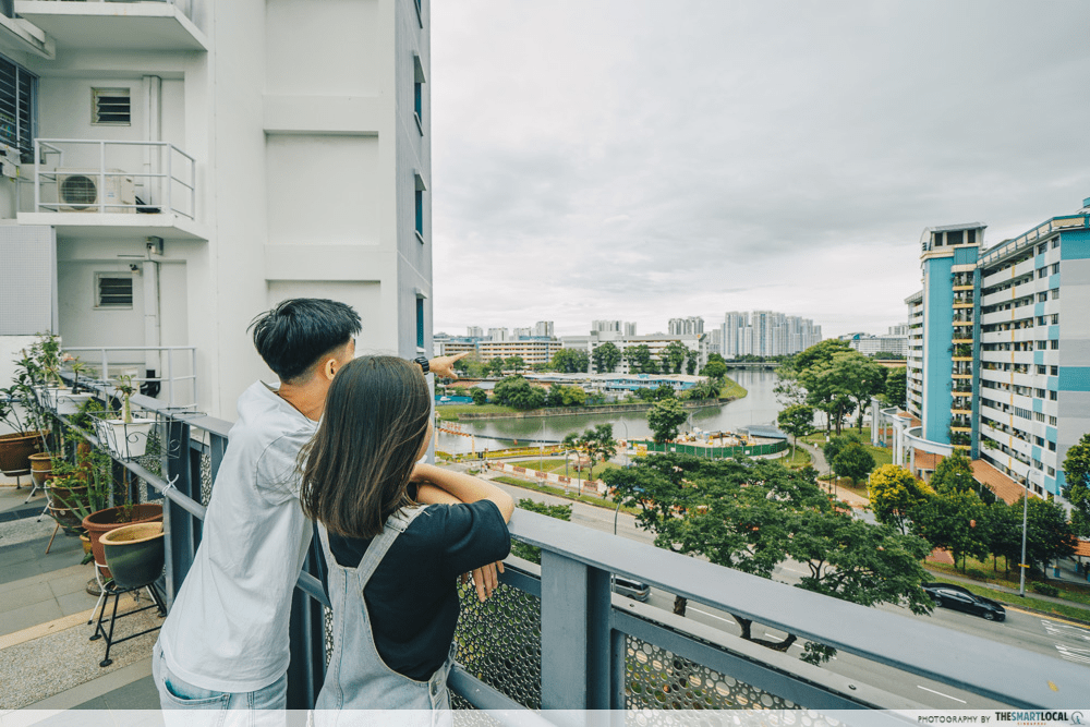 A couple looking at HDB flats