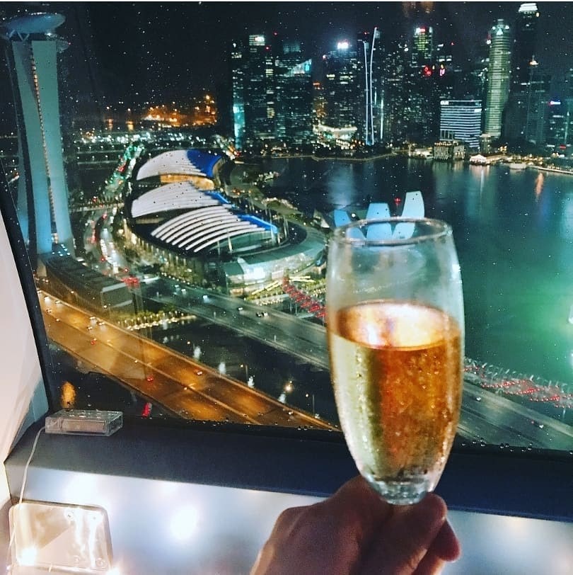 Drinking champagne in the Singapore Flyer