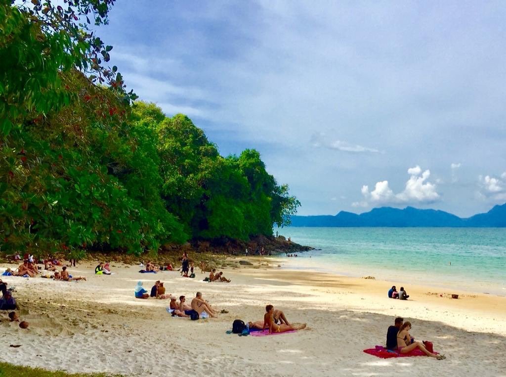 Best beaches in Malaysia - People chilling on the beach 