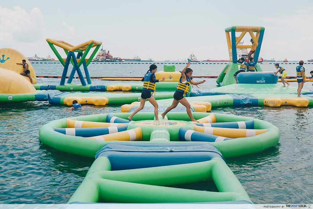 talents playing catch at HydroDash Sentosa 