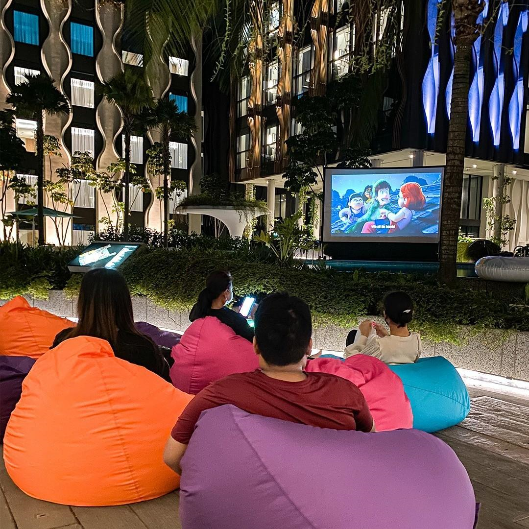 Family enjoying movie nights outdoors 