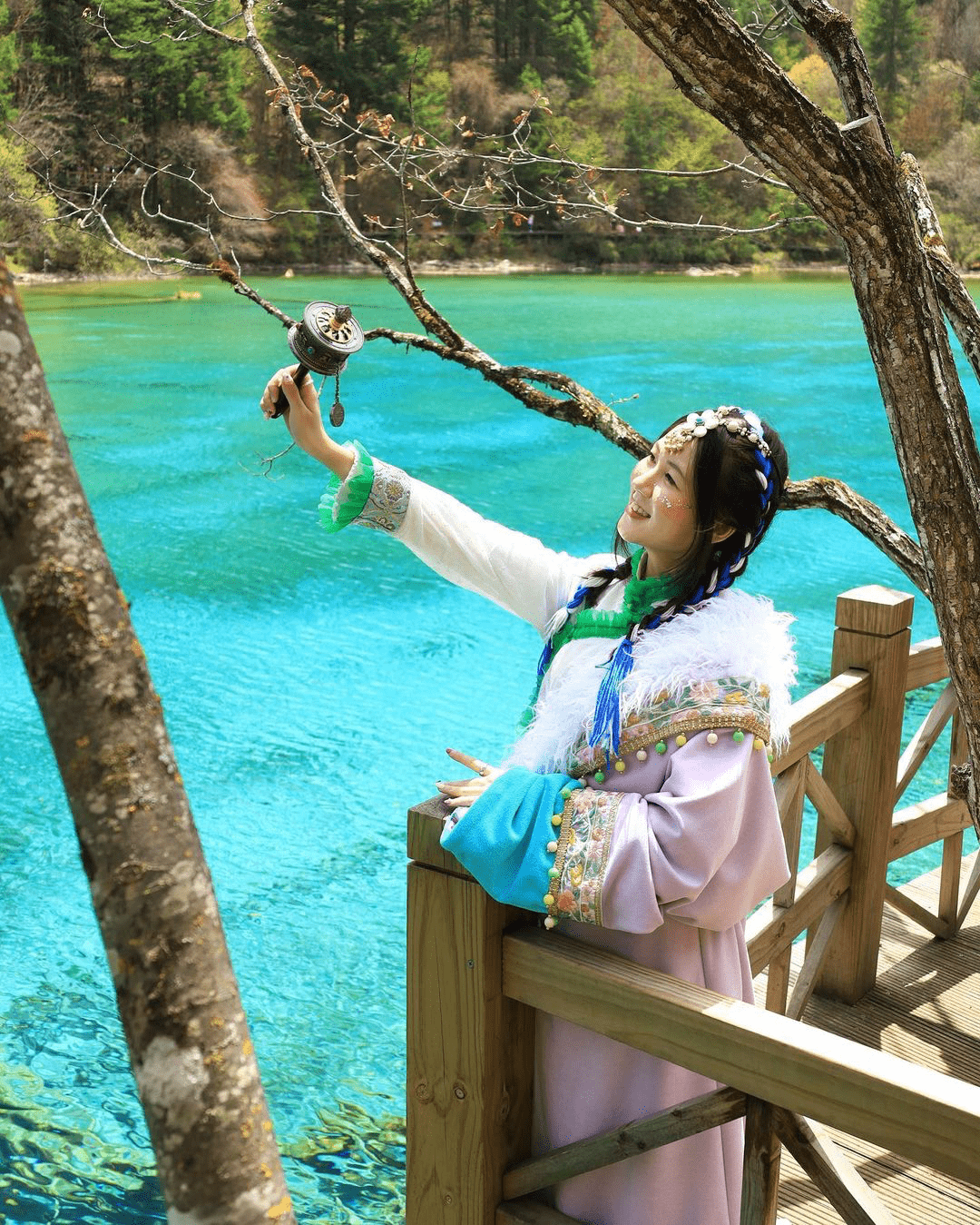 girl posing in tibetan costumes