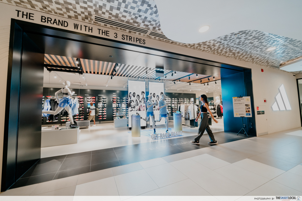 talent entering adidas store 