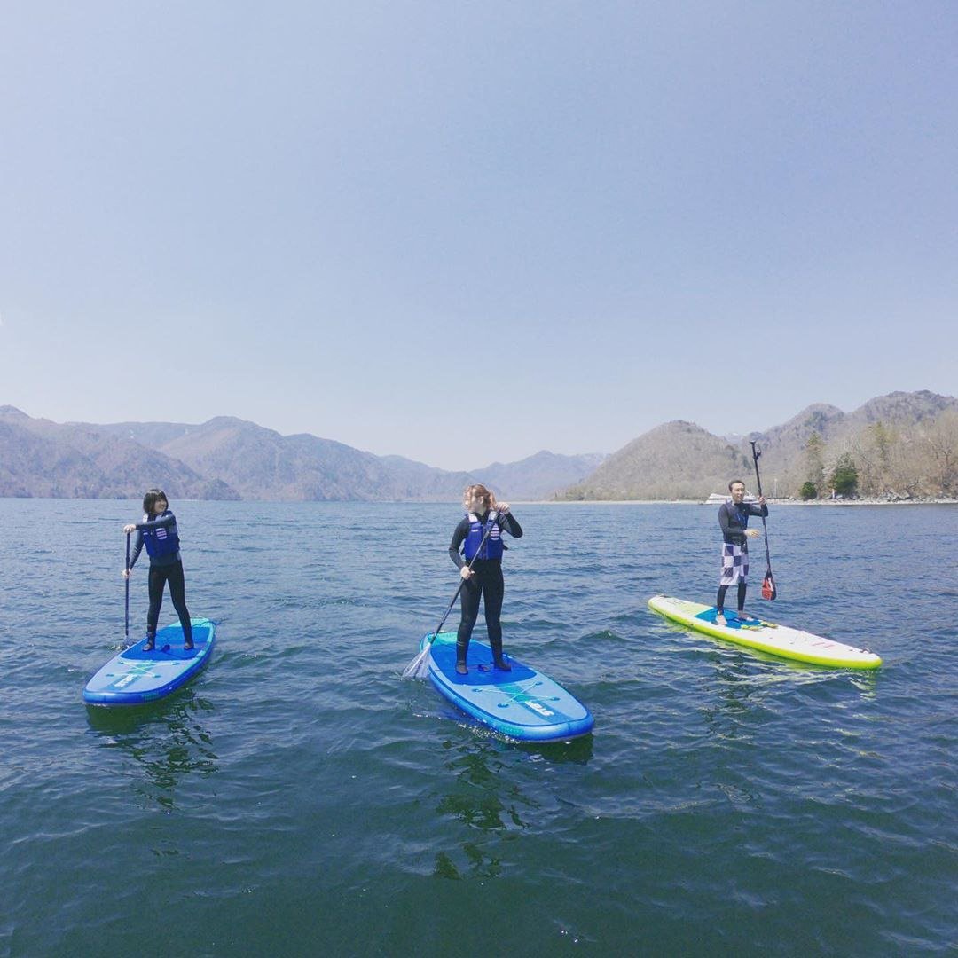 things to do nikko city - Lake Chuzenji paddle boarding