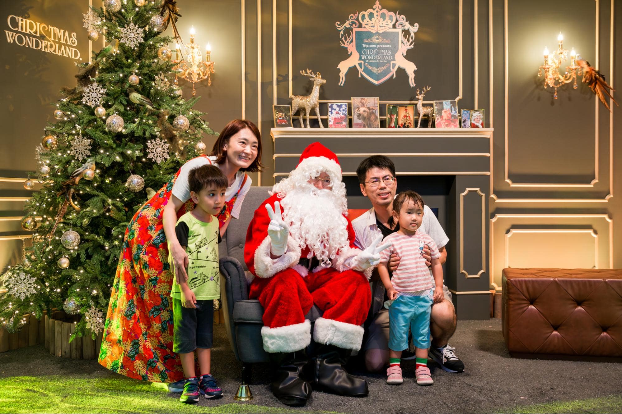 Family taking pics with Santa - Christmas Wonderland 2024 