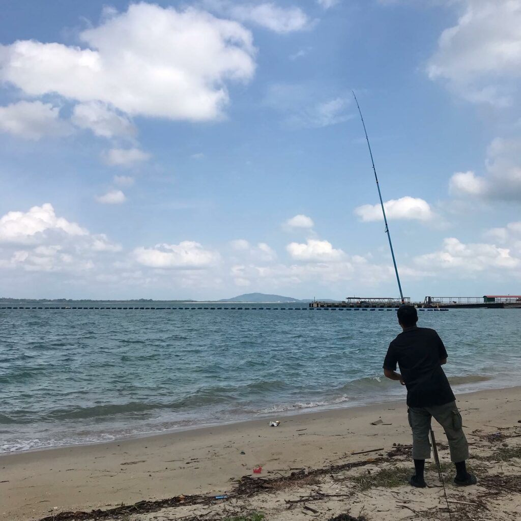 Fishing at Changi Beach Park