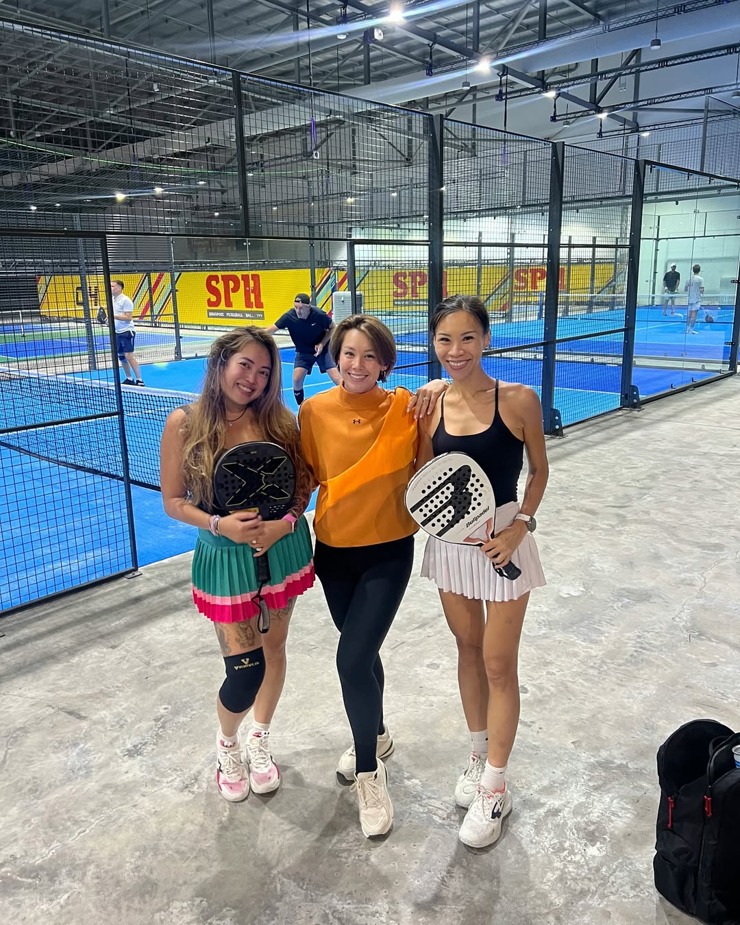 Girls playing pickleball